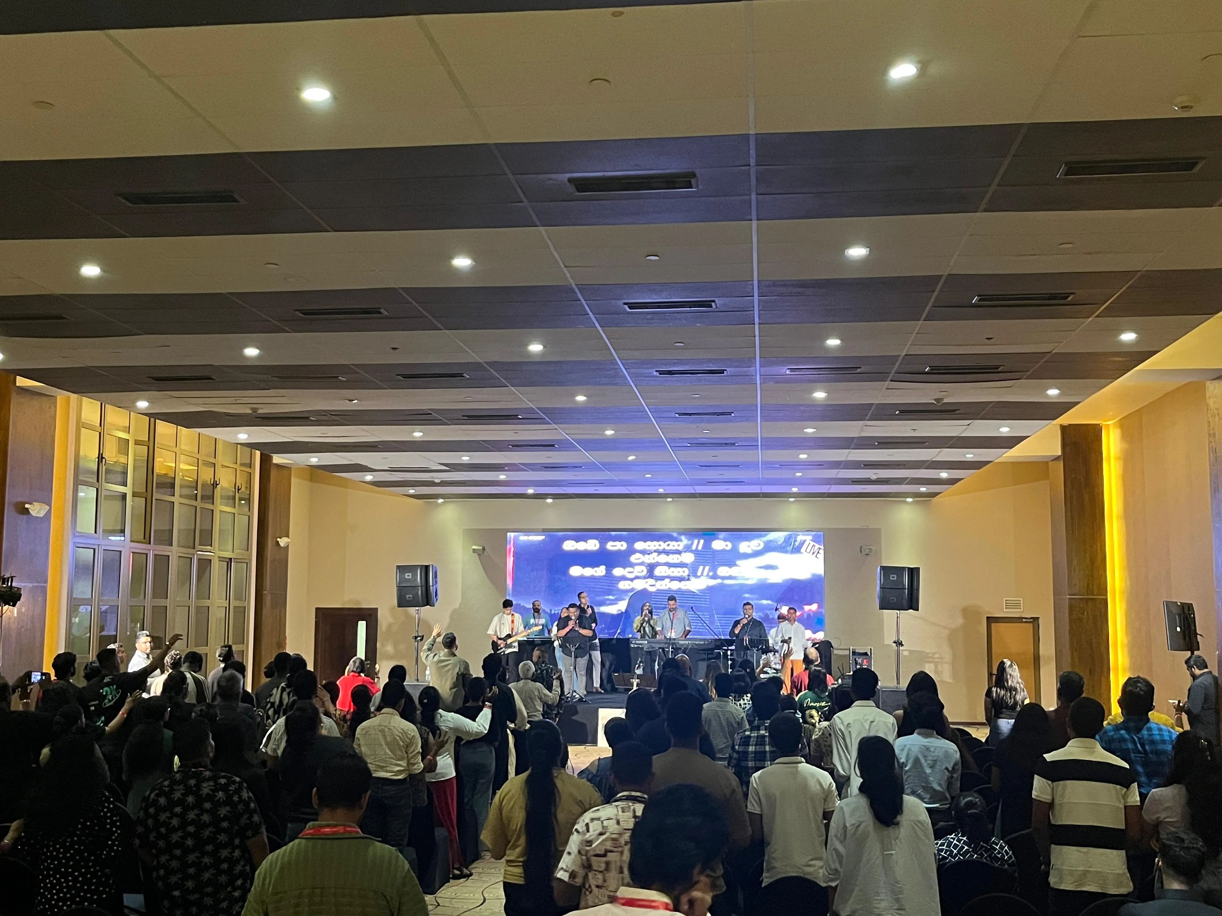 Large live event with crowd and stage sound reinforcement