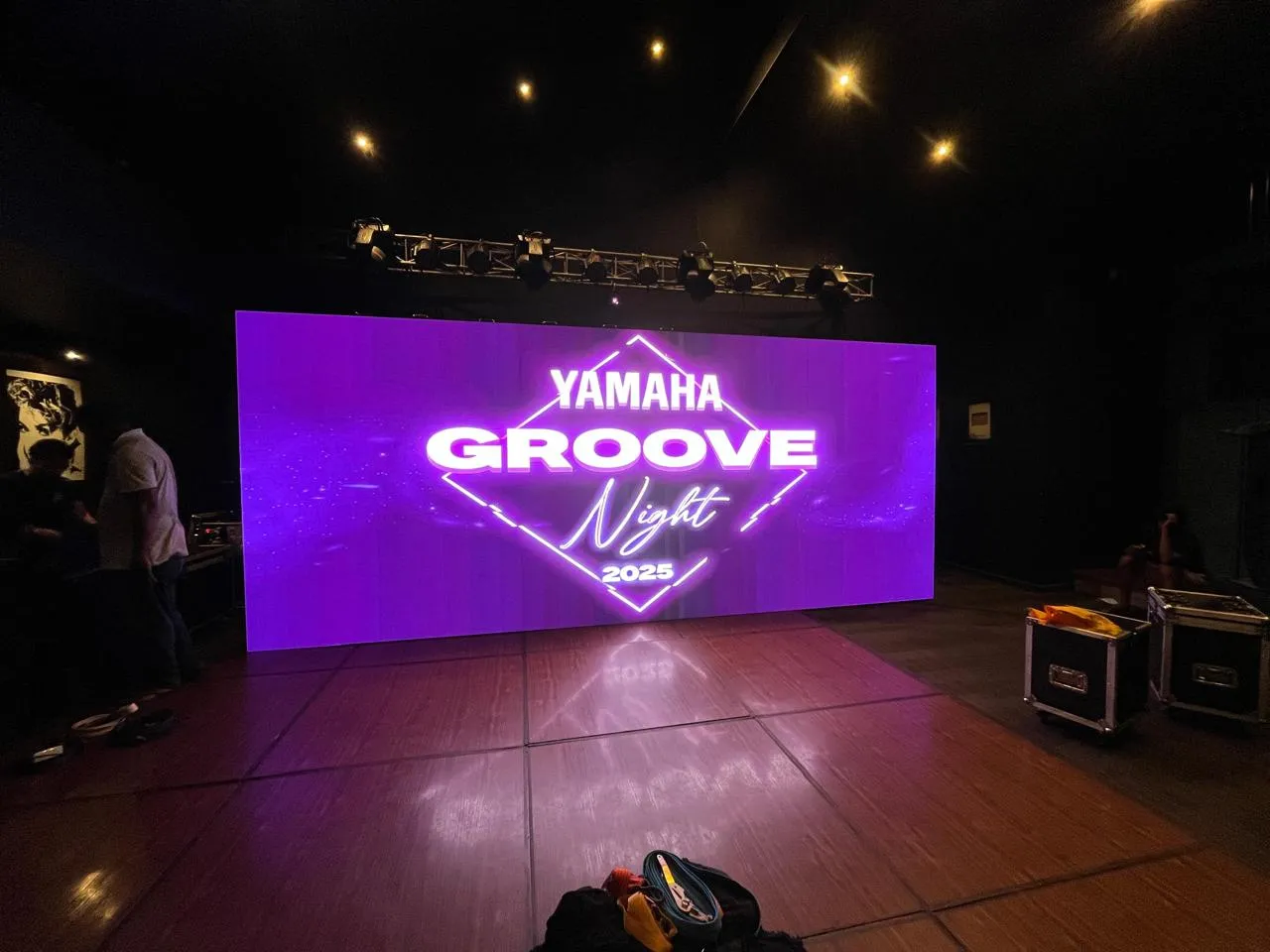 Corporate event seating with LED screen backdrop